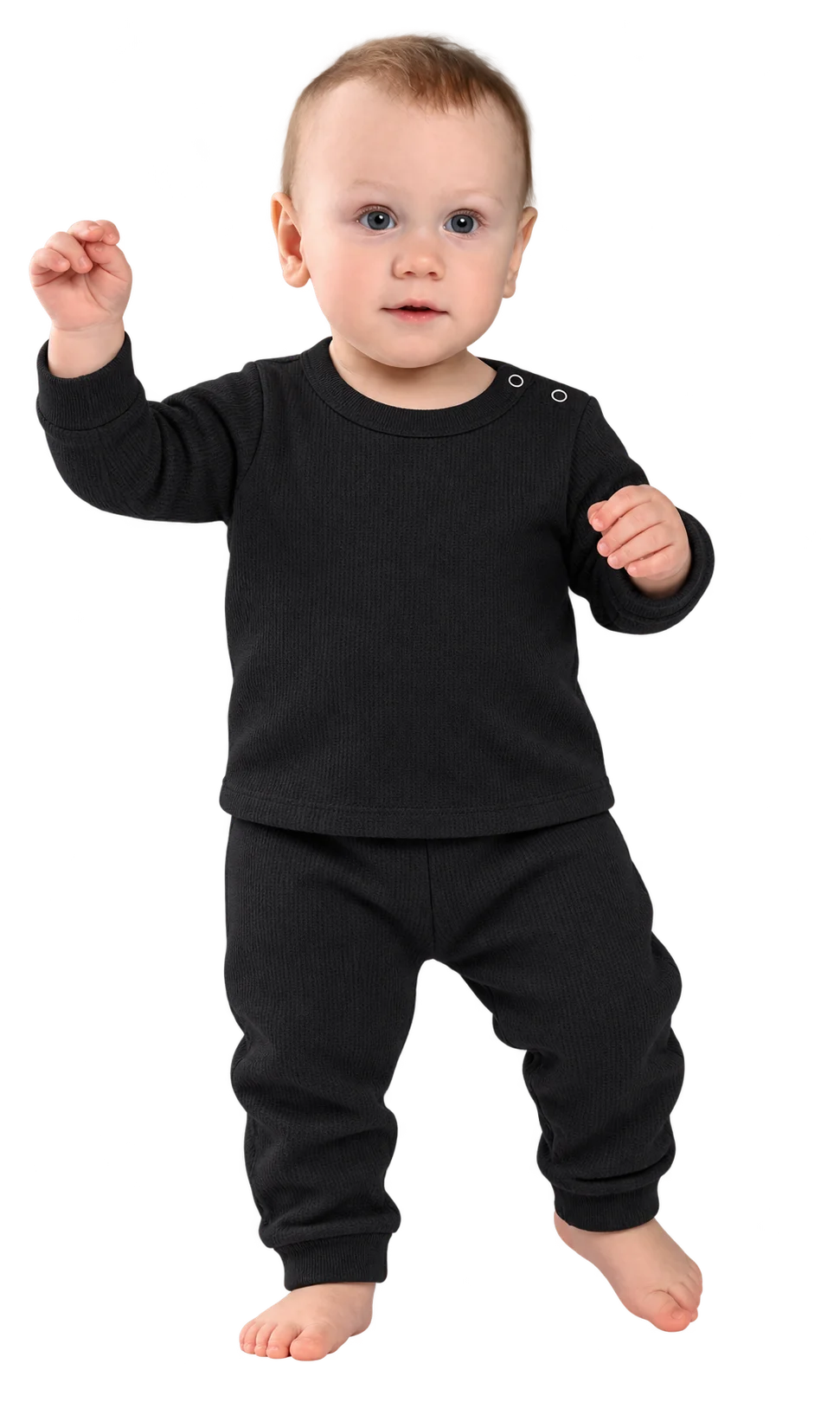 Standing baby boy wearing a black thermal T-shirt and pants